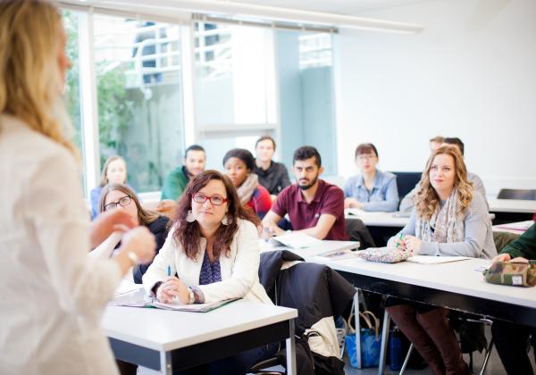 A group of business students sitting in a classroom