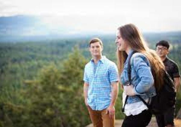 Students in nature looking off into the distance