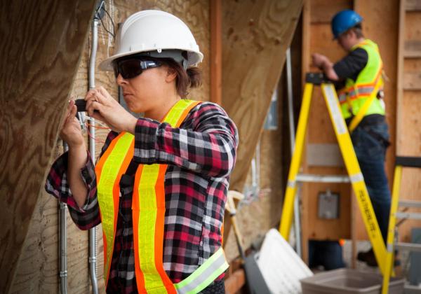 Construction worker building a house